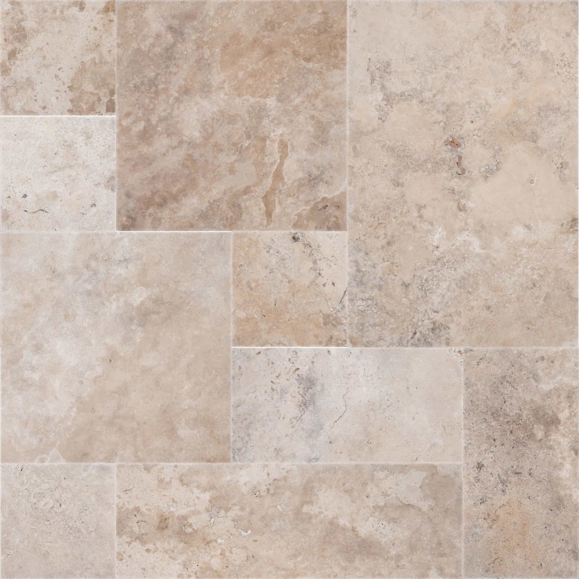 Close-up view of the Philly Travertine Tumbled French Pattern 3cm Paver by STONELUX. This natural stone features a rich blend of beige and cream tones, with subtle veining and a tumbled finish, ideal for adding a premium touch to hardscape projects.