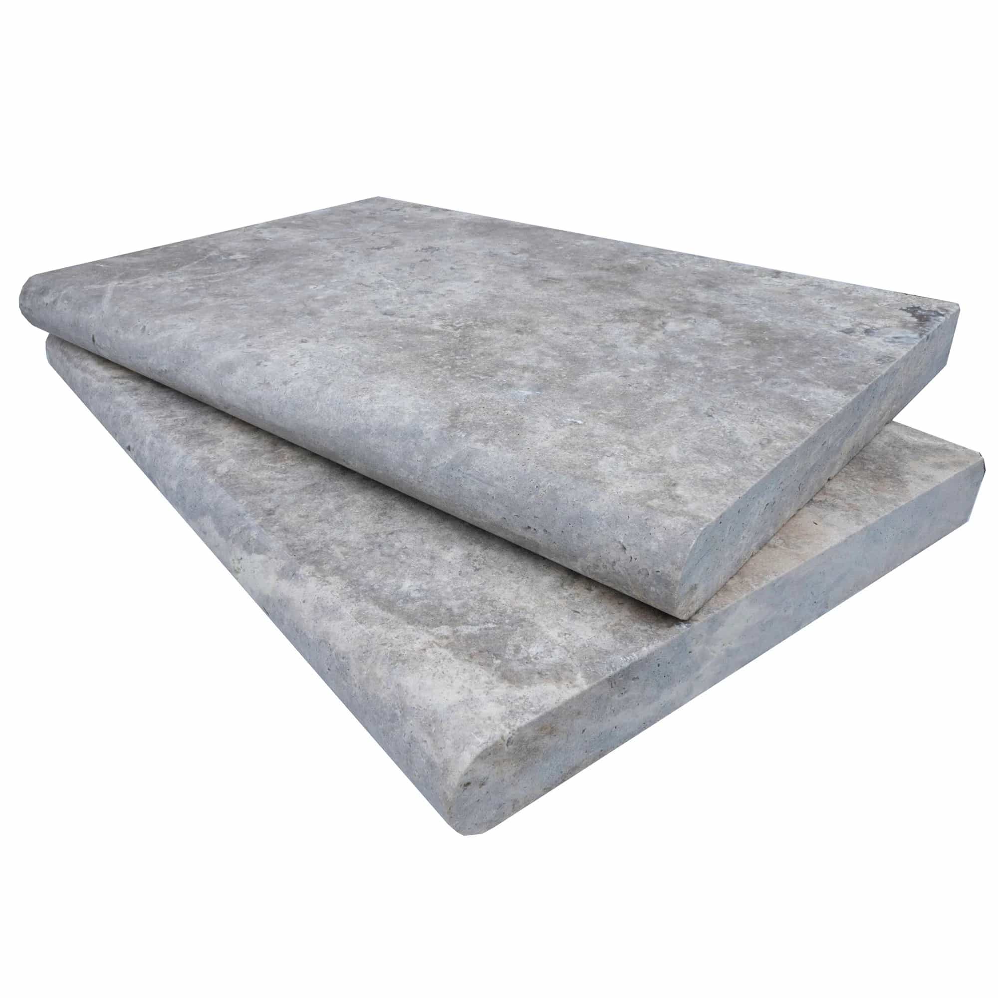 Close-up of Silver Travertine Tumbled 16x24x2 Single Bullnose Coping by STONELUX. This natural stone features a smooth, tumbled finish with subtle gray tones and soft veining, ideal for premium pool coping or patio edges. Perfect for luxury hardscape p...