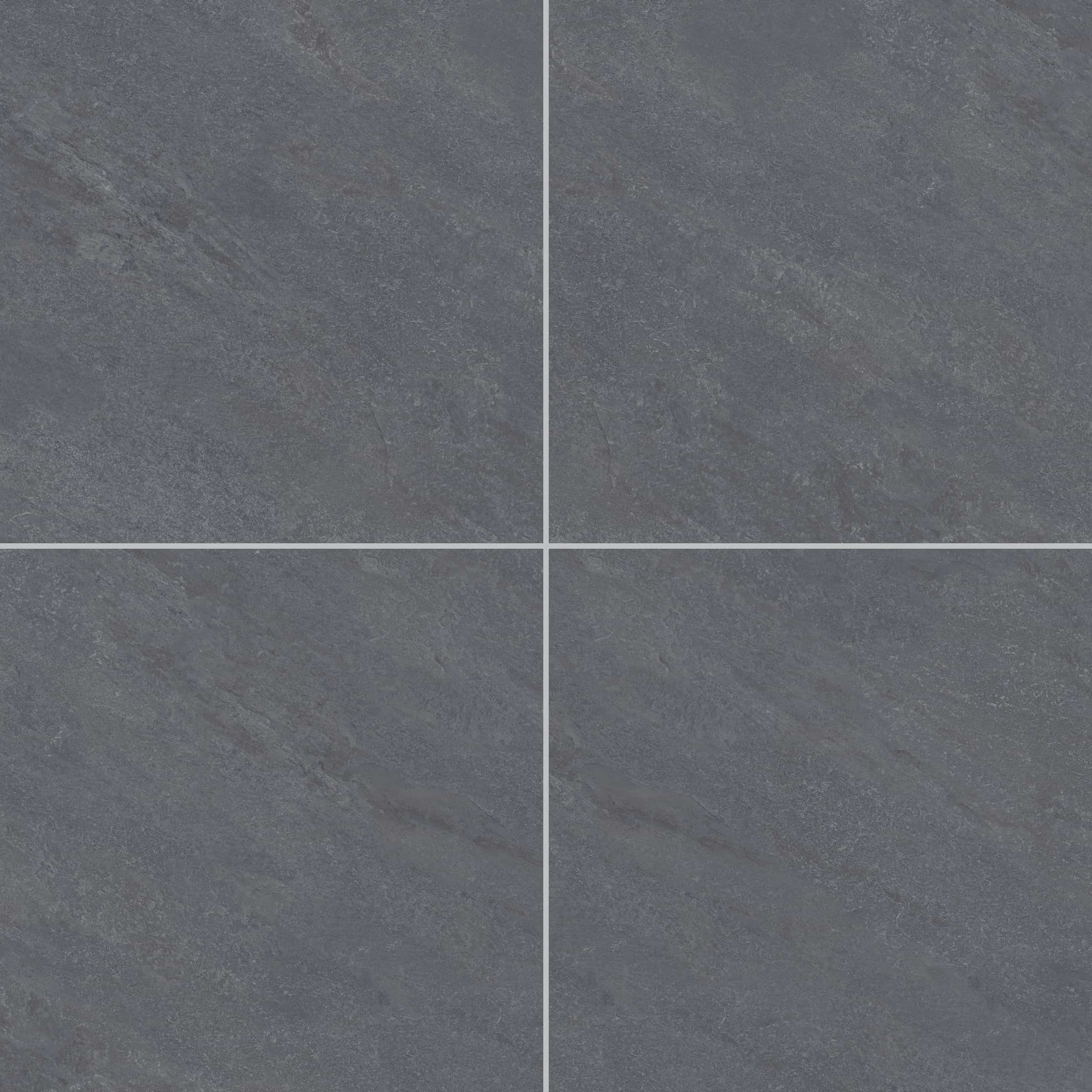 Close-up of Dakota Gray Matte 24x36x2cm Rectified Porcelain Paver showcasing its smooth matte finish and subtle gray veining. Ideal for modern hardscape projects, this durable porcelain paver offers a natural stone look for pool decks and patios.