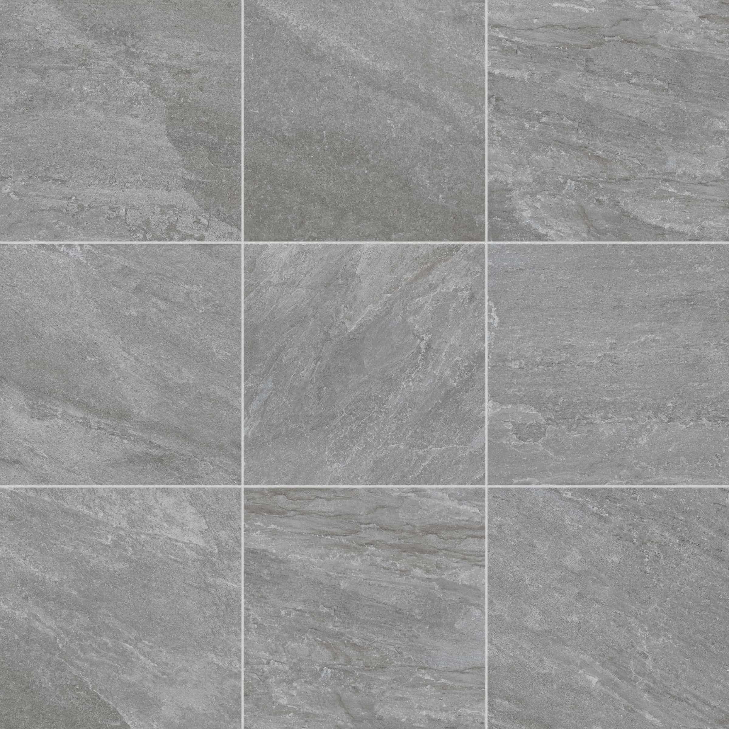 Close-up of Rasa Gray Matte 24x24x2cm Rectified Porcelain Paver showcasing its smooth matte finish and subtle gray veining. Ideal for modern hardscape projects, its natural stone appearance adds elegance to any pool deck or patio installation.