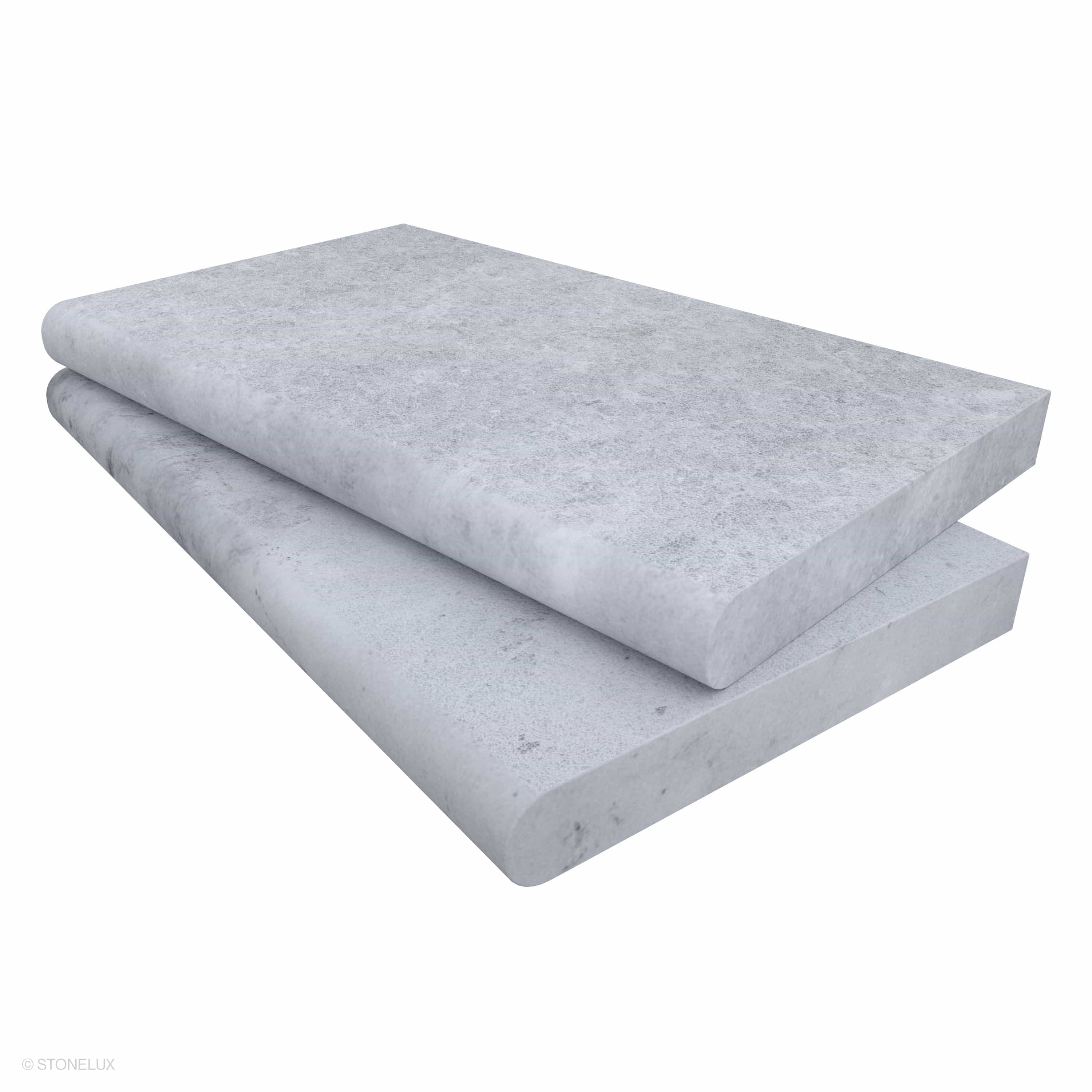 Close-up of the Tundra Grey Marble Sand Blasted 14x24x2 Single Bullnose Coping by STONELUX. This marble piece features a sandblasted finish with subtle grey texture and veining, ideal for pool edges and wall caps, highlighting its premium stone quality.