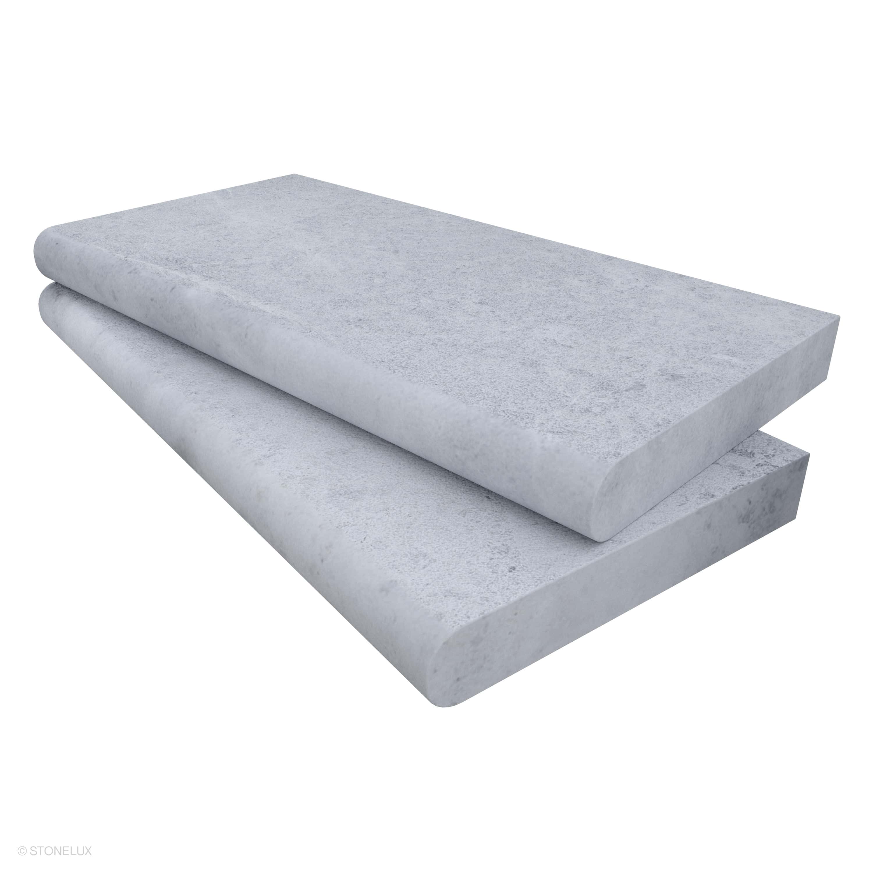 Tundra Grey Marble Sand Blasted 12x24x2 Single Bullnose Coping by STONELUX. The marble features a sandblasted finish with soft grey tones and subtle veining, ideal for pool edges and steps. Durable and elegant, perfect for modern hardscape projects.