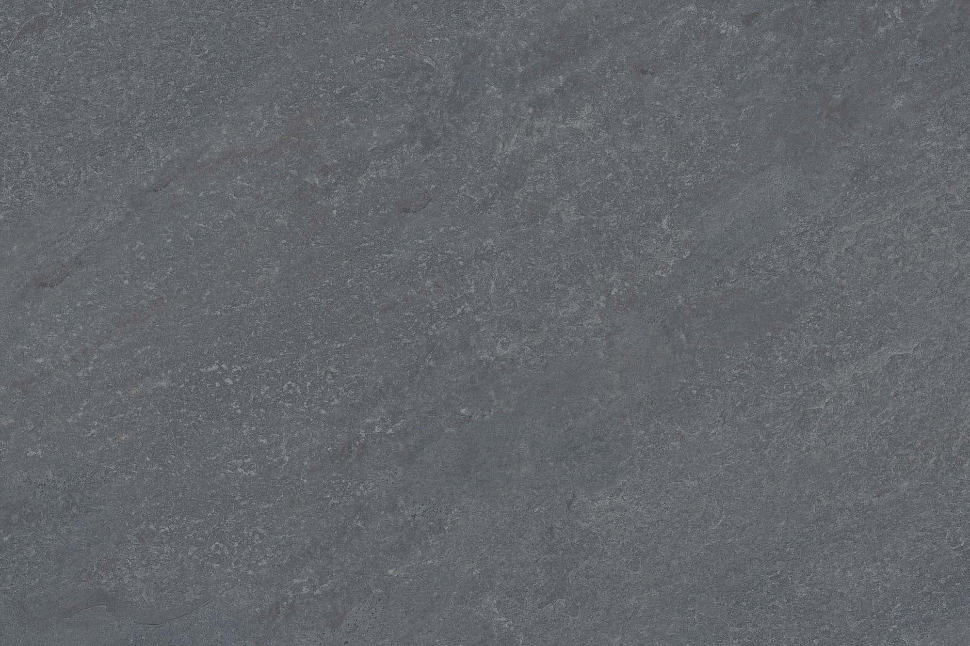 Close-up of the Dakota Gray Matte 24x36x2cm Rectified Porcelain Paver by STONELUX. The porcelain surface features a smooth, matte finish with subtle gray veining, offering a natural stone-like appearance ideal for modern outdoor hardscaping projects.