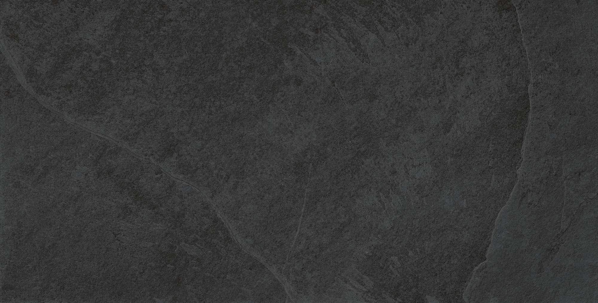 Close-up of the Overland Anthracite Matte 24x48x2cm Rectified Porcelain Paver showcasing its dark gray tone and subtle textured finish. Ideal for modern outdoor spaces, this porcelain paver offers a sleek, natural stone appearance for patios and pool d...