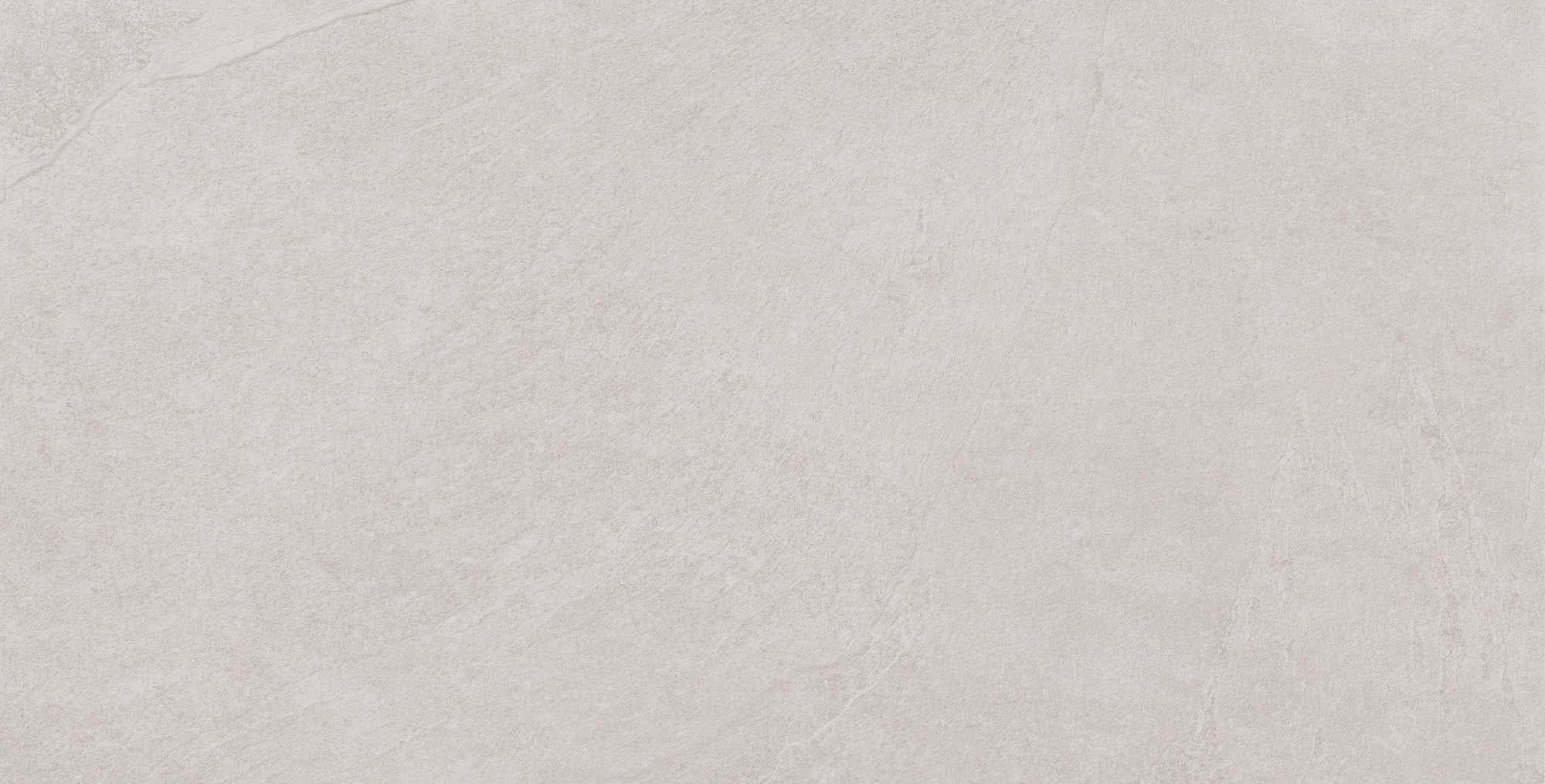 Close-up of the Overland Pearl Matte 24x48x2cm Rectified Porcelain Paver, showcasing its smooth matte finish and subtle, natural stone-like texture. The light cream color adds an elegant, timeless appeal, ideal for modern hardscape and poolside projects.
