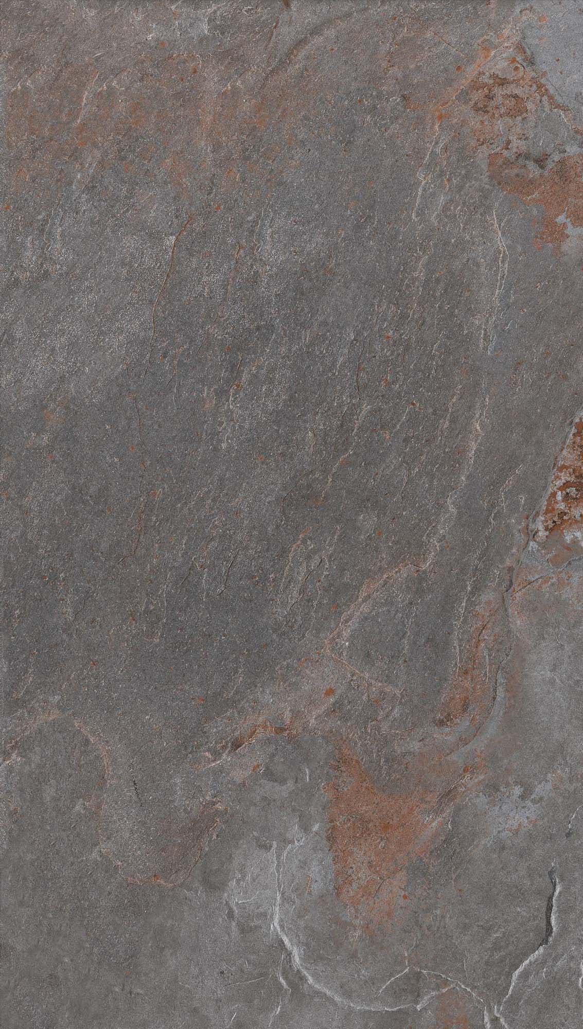 Close-up of Retrostone Matte 24x36x2cm Rectified Porcelain Paver from Stonelux. The paver features a natural stone appearance with subtle gray tones and earthy veining. Its matte finish offers a refined texture, ideal for patios and hardscape projects.
