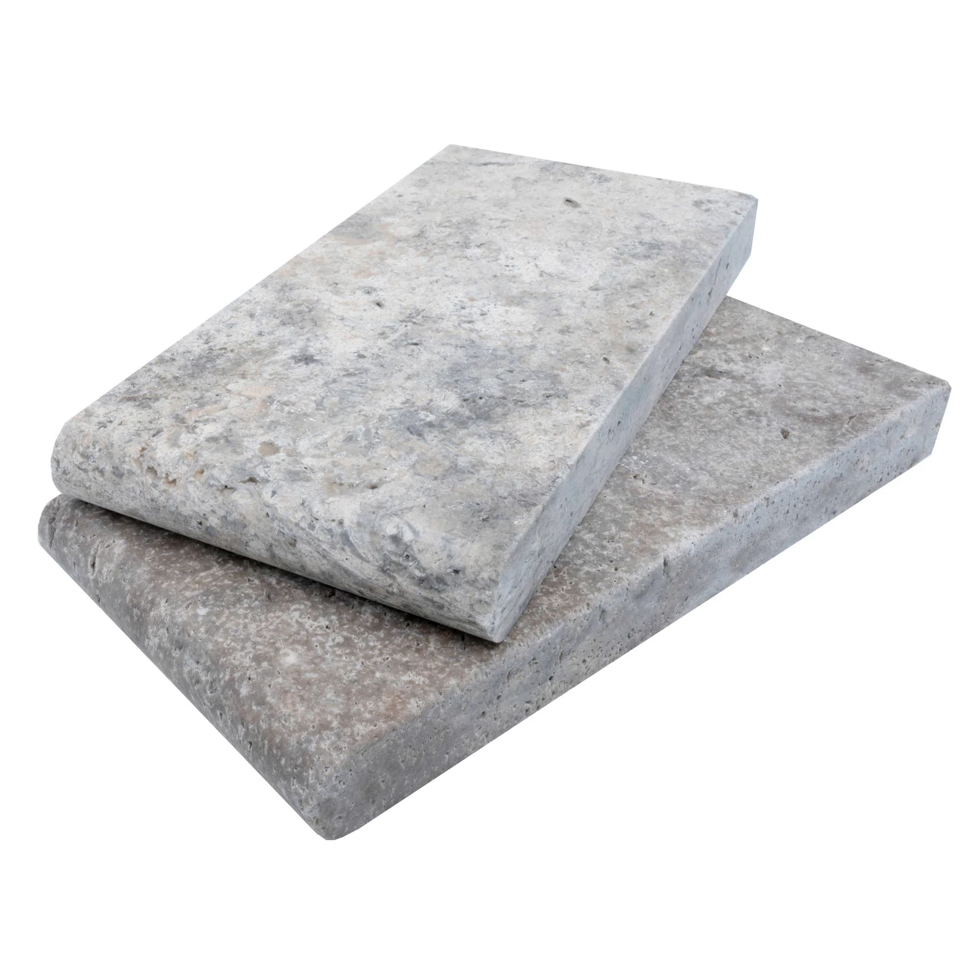 Close-up of Silver Travertine Tumbled 6x12x3cm Single Bullnose Coping. The premium natural stone features a soft gray hue with subtle veining and a textured, tumbled finish, ideal for pool coping and hardscape projects. Perfect for elegant outdoor desi...