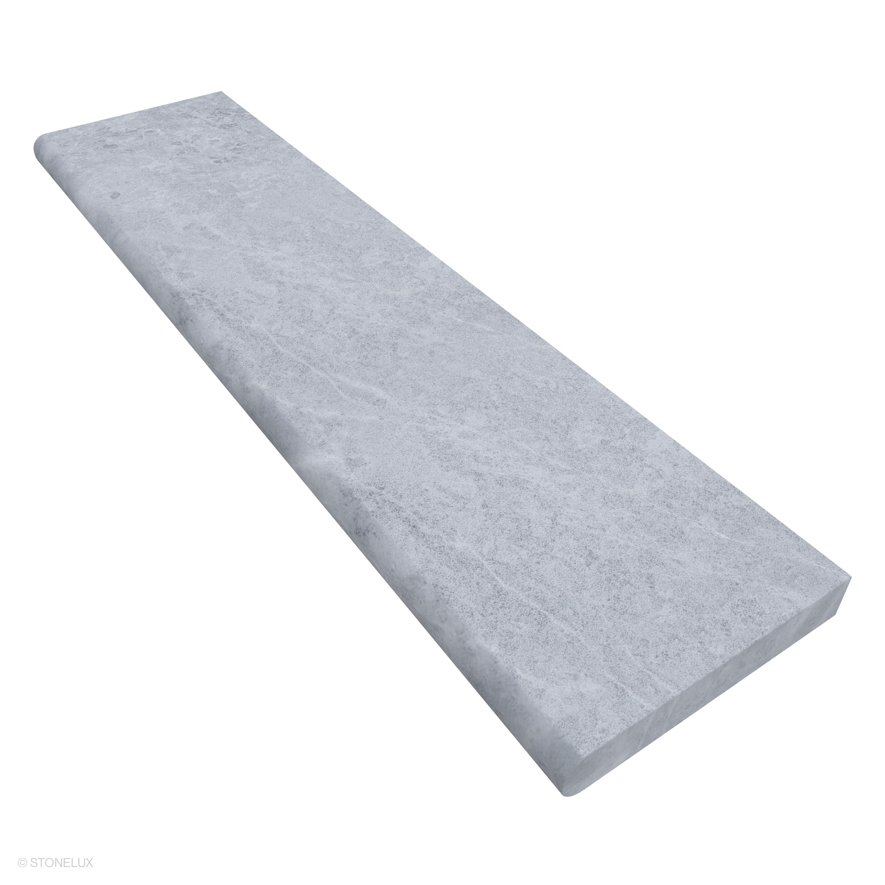Close-up of the Tundra Grey Marble Sand Blasted Coping, showcasing its sandblasted texture and subtle grey veining. This 12x48x2 inch single bullnose marble piece is ideal for pool edges or steps, offering a sleek, premium finish for hardscape projects.