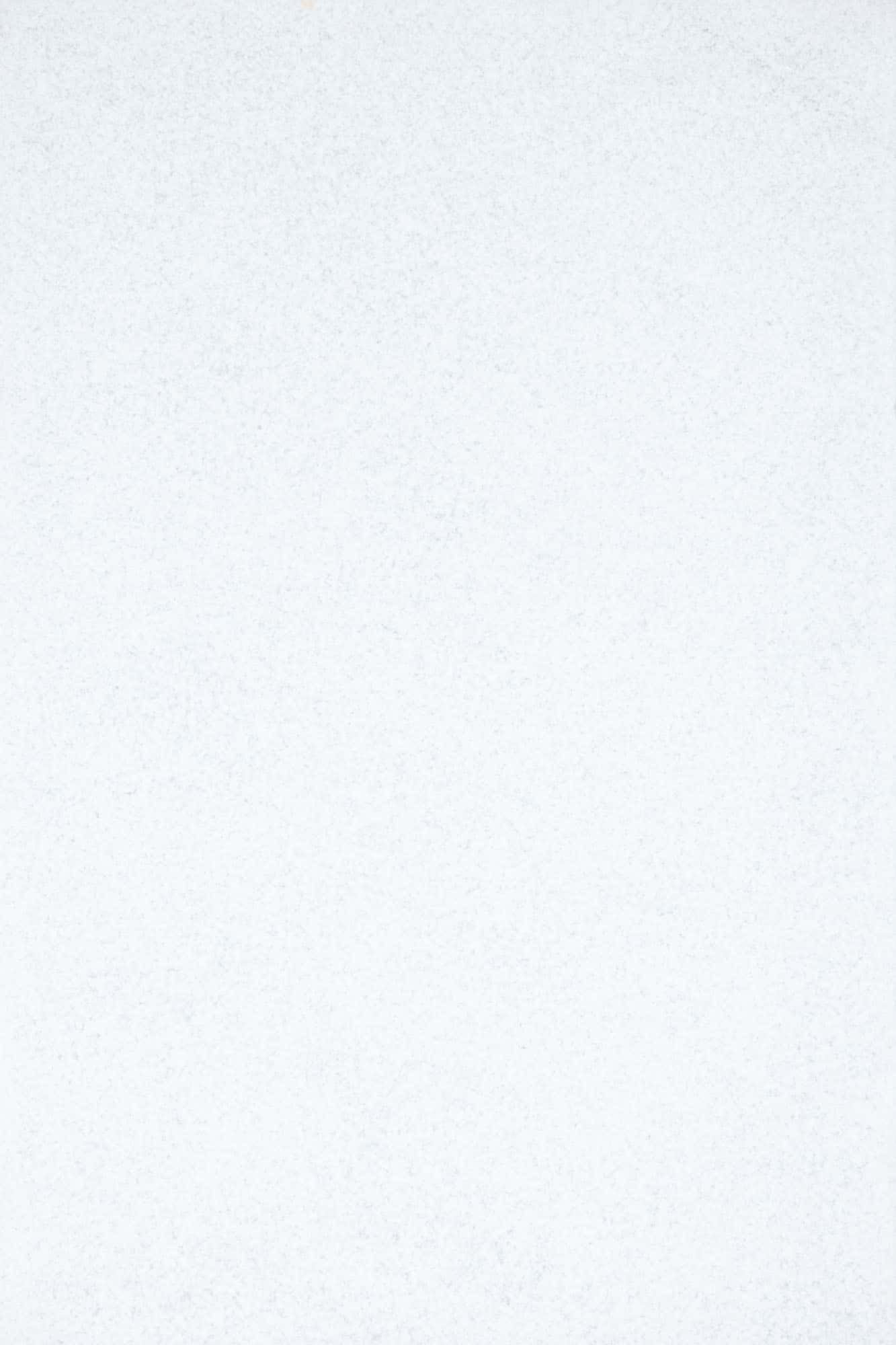 Close-up of Afyon White Marble Sand Blasted 16x24 3cm Paver by STONELUX. The marble showcases a smooth, sandblasted texture with subtle, elegant veining in a pristine white hue, ideal for luxury hardscape projects and pool surrounds.