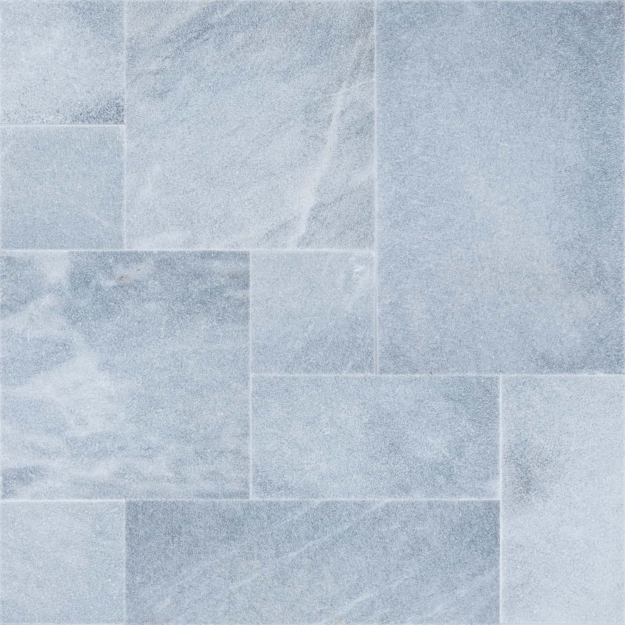 Close-up of Arctic Grey Marble Sand Blasted French Pattern 3cm Paver by STONELUX. The marble paver features a subtle grey hue with a sandblasted finish, showcasing fine texture and natural veining, ideal for elegant hardscape designs.