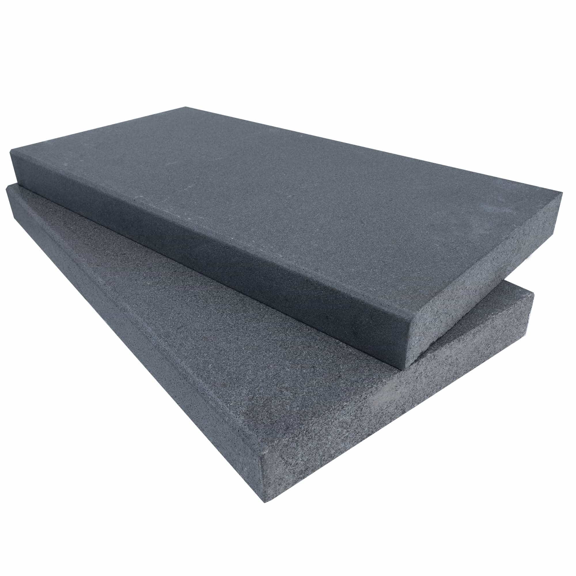 Two STONELUX Black Basalt Tumbled+Brushed 12x24x2 Eased Edge Coping (beveled) pieces are stacked slightly askew on a white background.