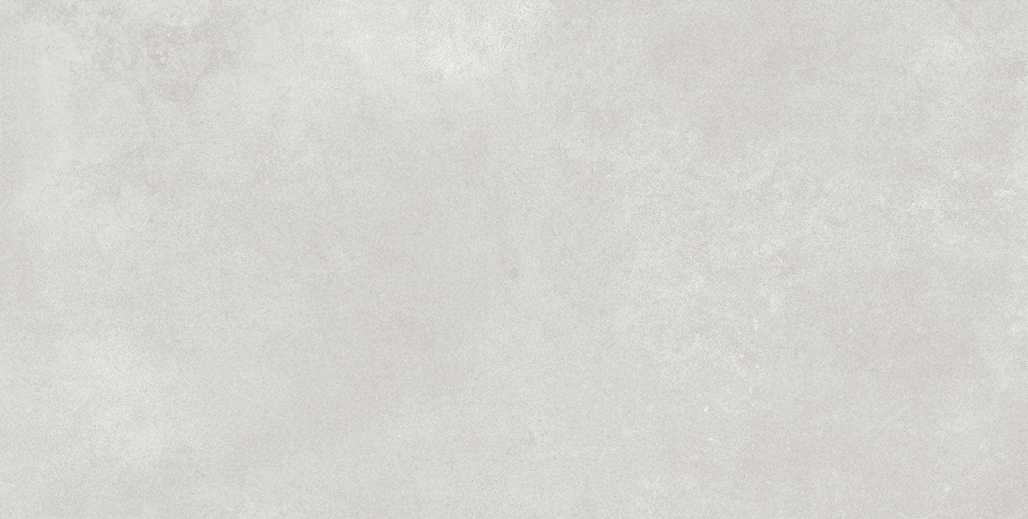 Close-up of Luna Off White Matte 24x48x2cm Rectified Porcelain Paver by STONELUX, showcasing a smooth matte finish with subtle texture and light veining. Ideal for modern outdoor spaces, patio flooring, and poolside installations.