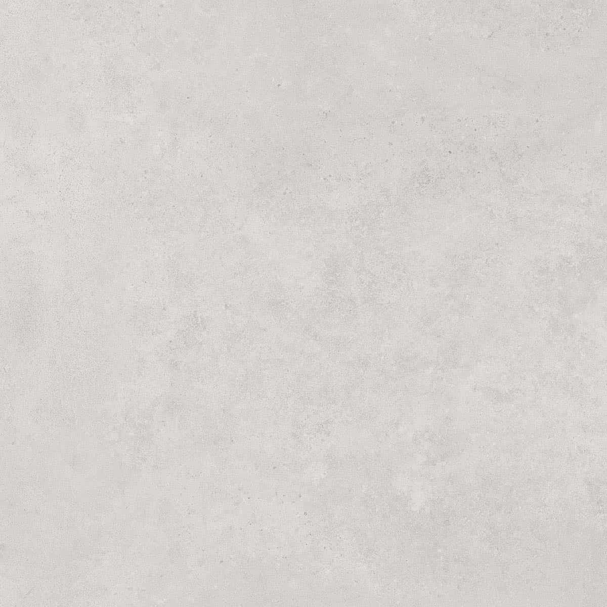 Close-up of Nexus White Matte 24x24x2cm Rectified Porcelain Paver by STONELUX, showcasing a smooth matte finish with subtle gray veining. Ideal for modern hardscape projects, this porcelain tile offers a natural stone look, perfect for patios and pool ...