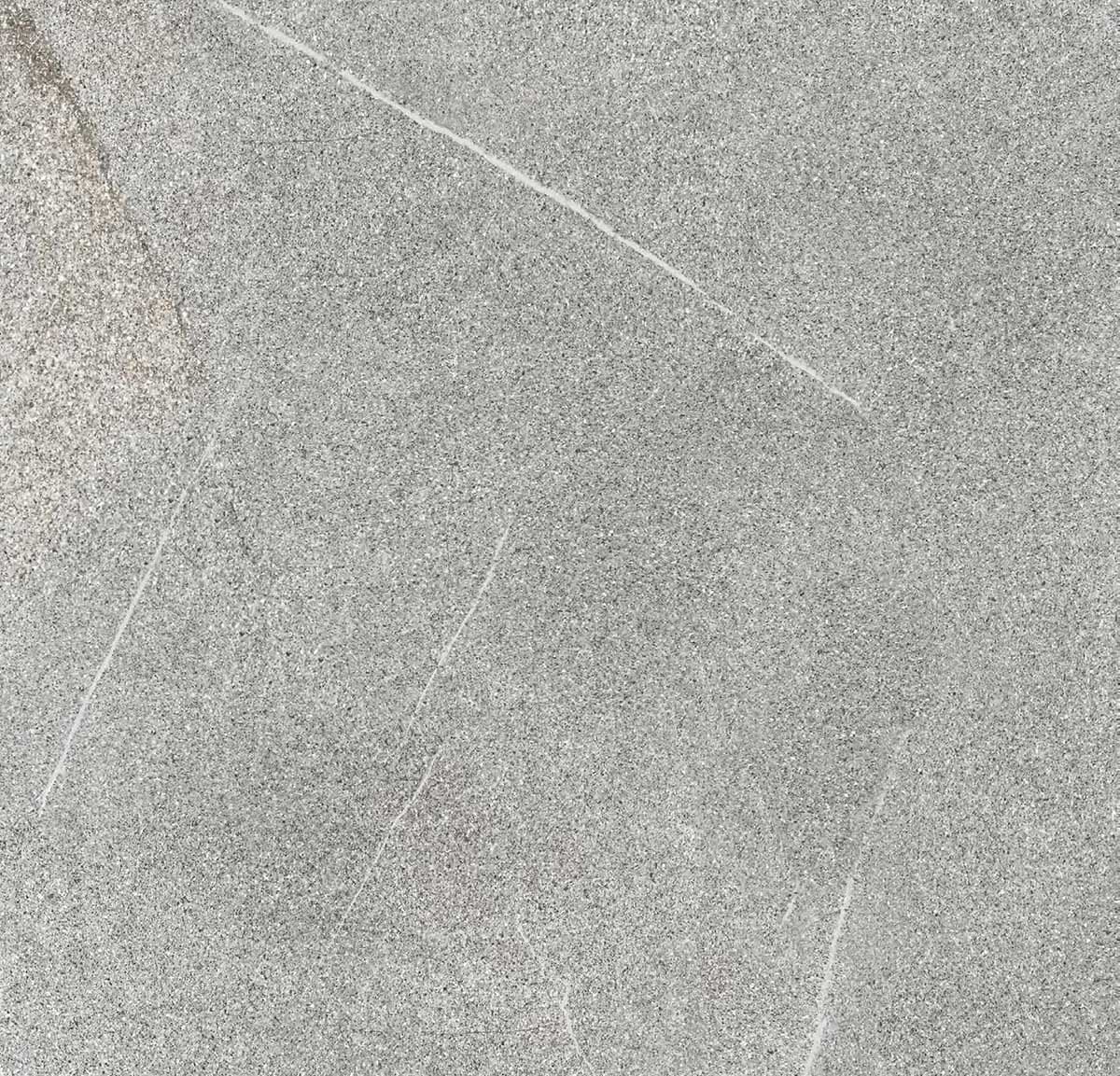 Close-up image of the Piasentina Grey Matte 24x24x2cm Rectified Porcelain Paver. The surface features a smooth matte finish with subtle grey tones and fine veining, mimicking natural stone texture, ideal for modern hardscape projects.