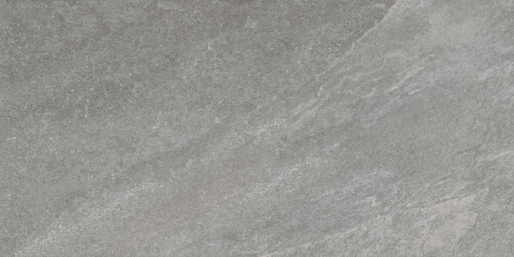 Close-up of the Rasa Gray Matte 24x48x2cm Rectified Porcelain Paver by STONELUX. This porcelain paver features a smooth matte finish with a natural stone appearance, showcasing subtle gray veining and a textured surface ideal for modern hardscape proje...