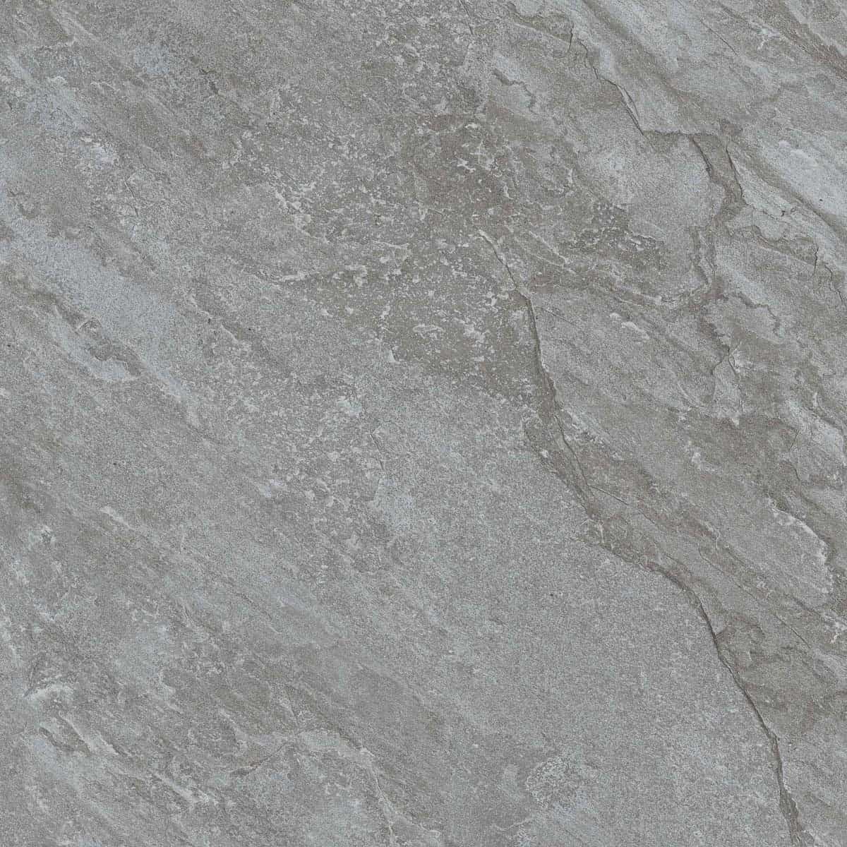 Close-up of the Rasa Gray Matte 24x24x2cm Rectified Porcelain Paver by STONELUX, showcasing its natural stone texture and subtle gray veining. Ideal for hardscape projects, the matte finish enhances its elegant, modern appeal.