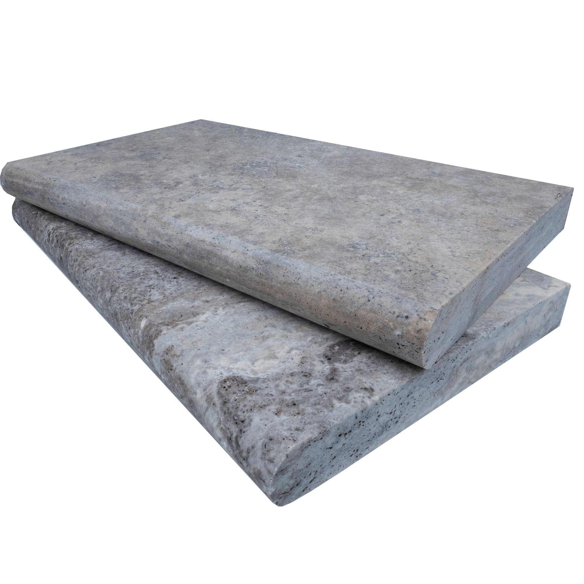 Close-up of Silver Travertine Tumbled 14x24x2 Single Bullnose Coping, showcasing its natural stone texture with soft gray tones and subtle veining. Ideal for pool coping and hardscape projects, this premium travertine offers a rustic, elegant finish.