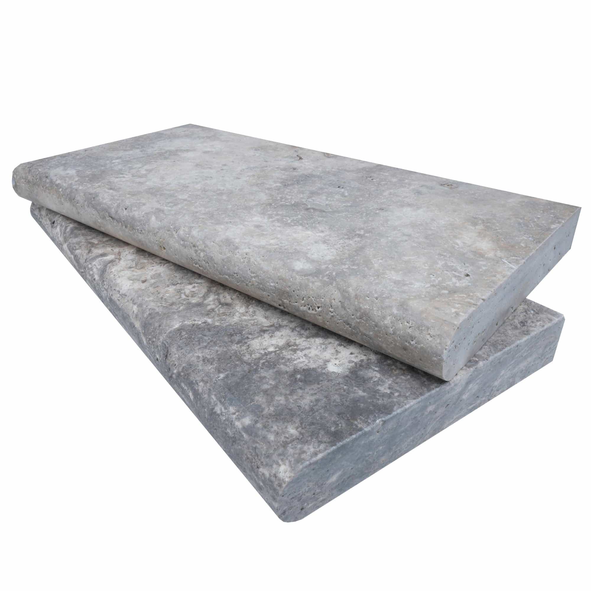 Close-up of Silver Travertine Tumbled 12x24x2 Single Bullnose Coping. The natural stone features a soft, tumbled finish with light gray and silver tones, showcasing subtle veining and textures ideal for pool coping and hardscape projects.