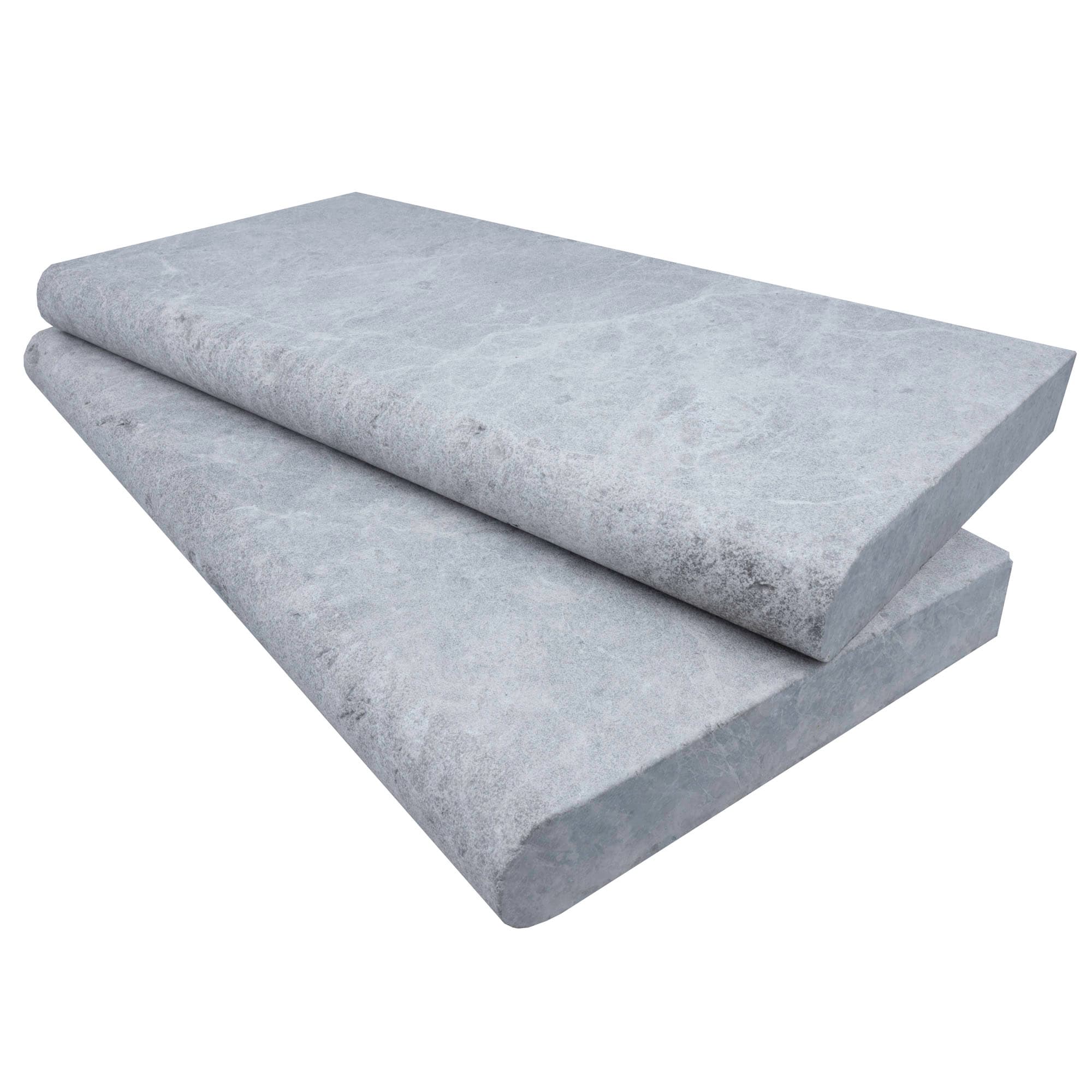 Close-up of Tundra Grey Marble Sand Blasted 12x24x2 Single Bullnose Coping. The marble features a smooth, sandblasted finish with subtle grey veining, showcasing its natural stone elegance and durability for pool coping or patio projects.
