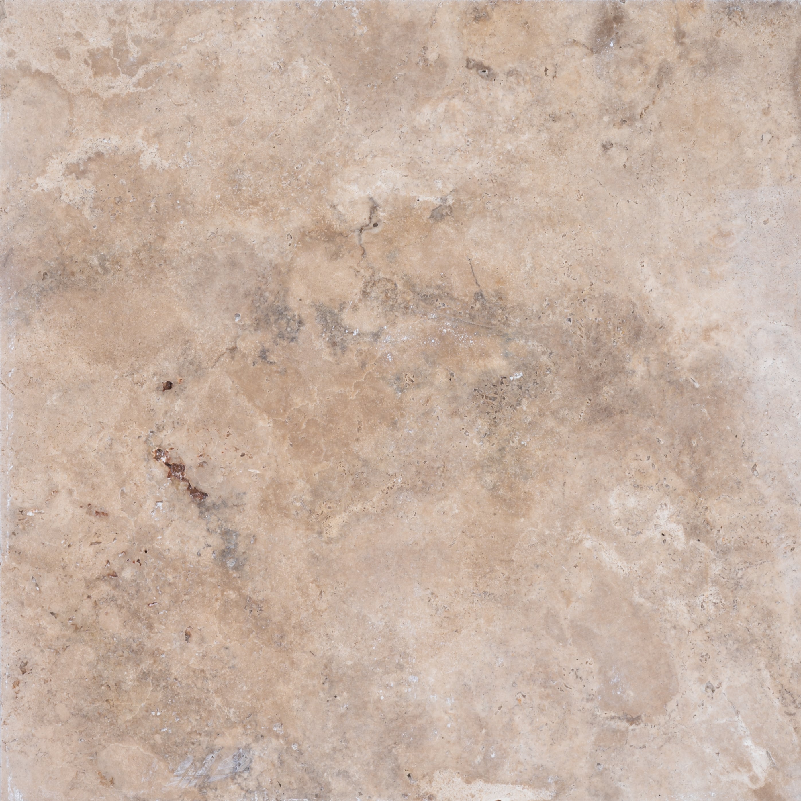 Close-up of Stonelux Walnut Travertine natural stone showcasing its warm beige and tan hues with subtle veining and a textured surface, ideal for upscale hardscape projects, pool decks, and patios.