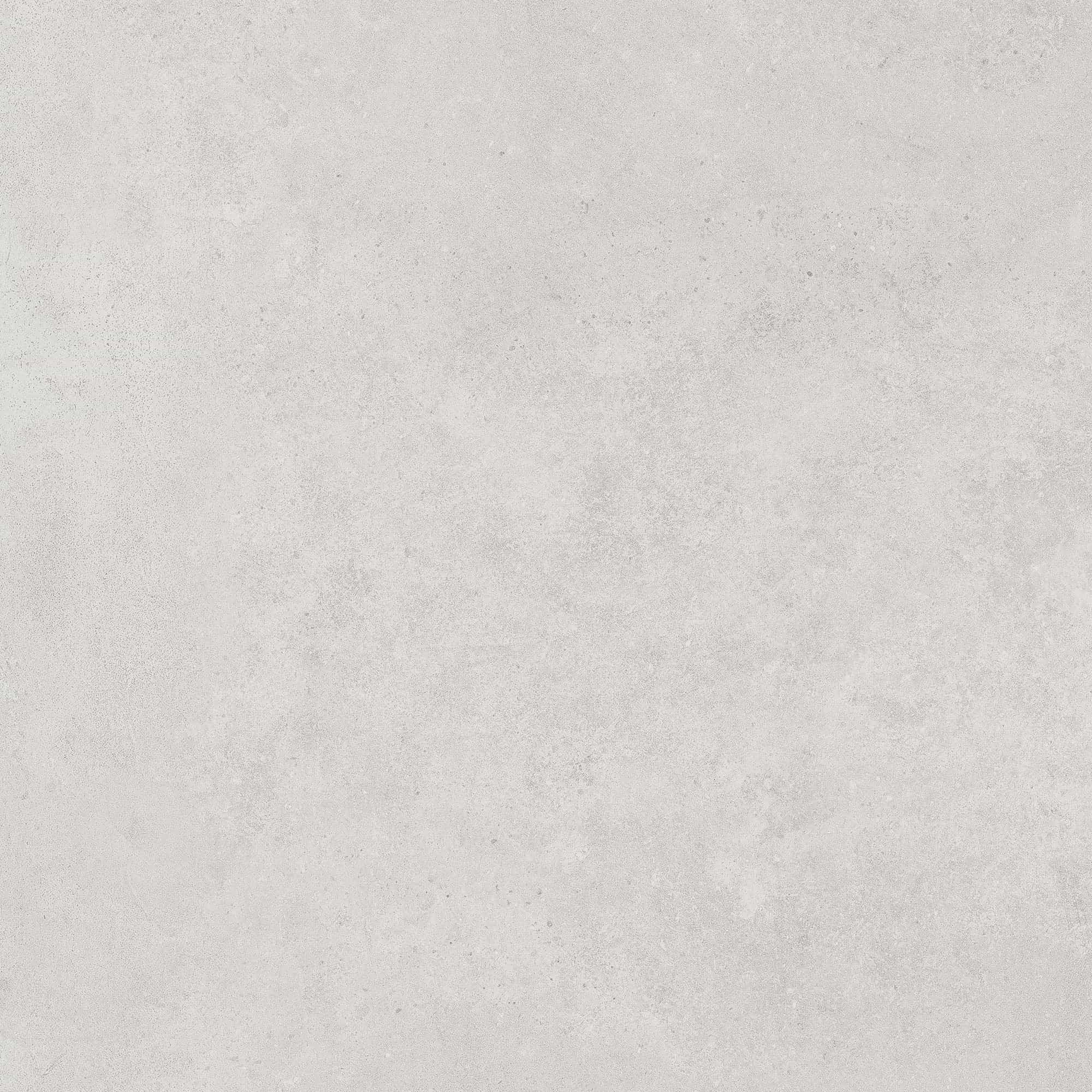 Close-up of Nexus White Matte 24x48x2cm Rectified Porcelain Paver by STONELUX. The paver showcases a smooth, matte finish with subtle white and grey veining, ideal for modern hardscape projects. Perfect for patios, pool decks, and outdoor spaces.