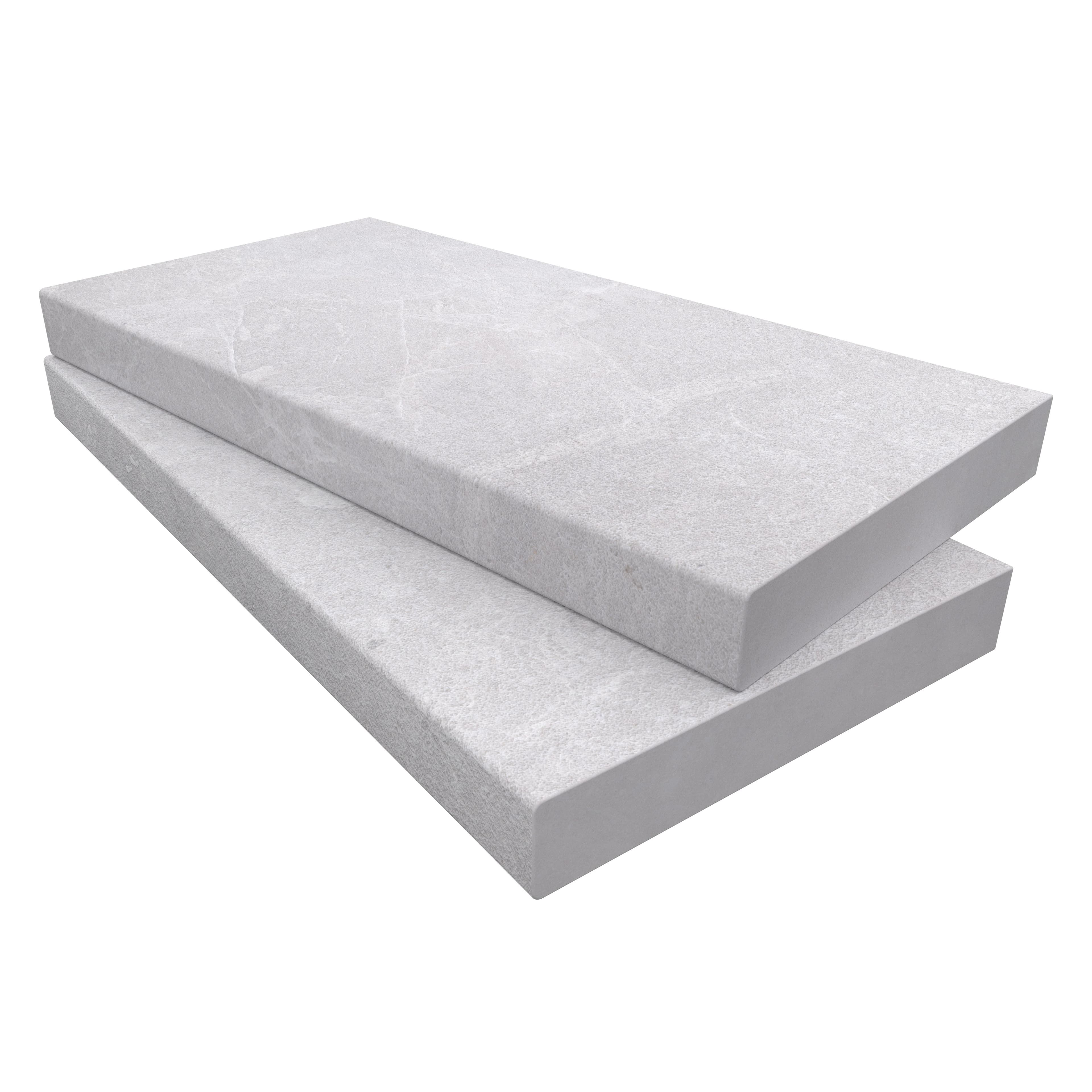 Close-up of Pera Cream Marble Sand Blasted 12x24x2 Eased Edge Coping by STONELUX. This marble piece features a sandblasted texture with subtle veining, ideal for pool edges or steps, offering a premium, elegant finish to hardscape projects.