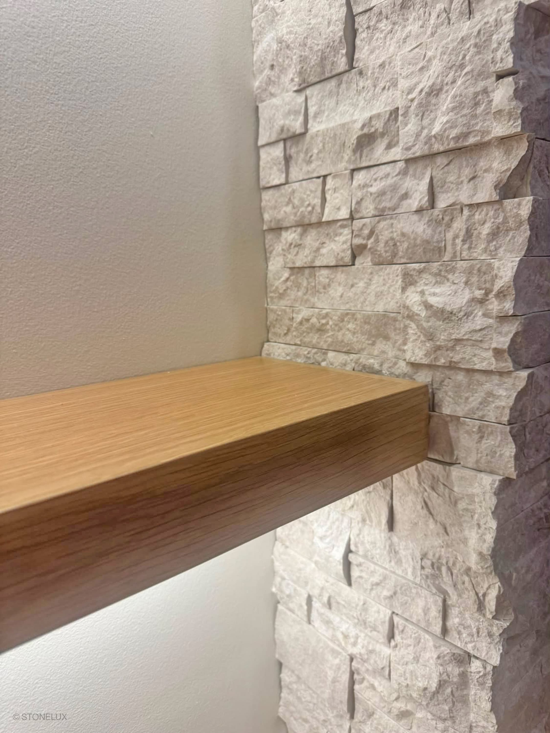 Close-up of the Pera Cream Marble Splitface Ledger Panel Corner - 6x6 by STONELUX, showcasing its textured, natural marble surface with creamy tones and rugged splitface finish. Ideal for enhancing wall aesthetics in modern interiors. SKU: LP-PERCREMAR...