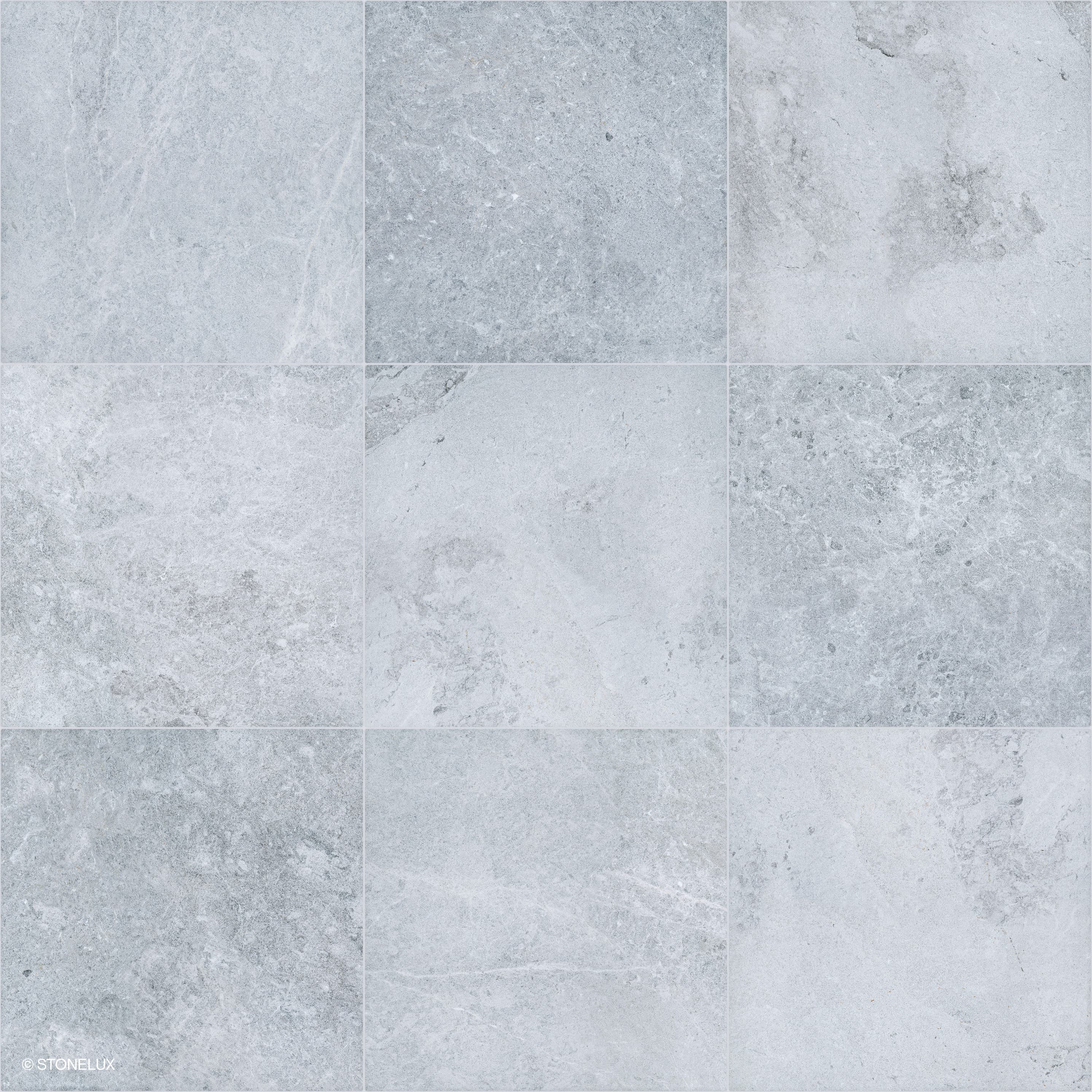 Close-up of Tundra Grey Marble Sand Blasted 24x24 3cm Paver by STONELUX, showcasing a refined sandblasted finish. The marble features subtle grey tones with delicate veining, ideal for sophisticated hardscape designs and poolside installations.