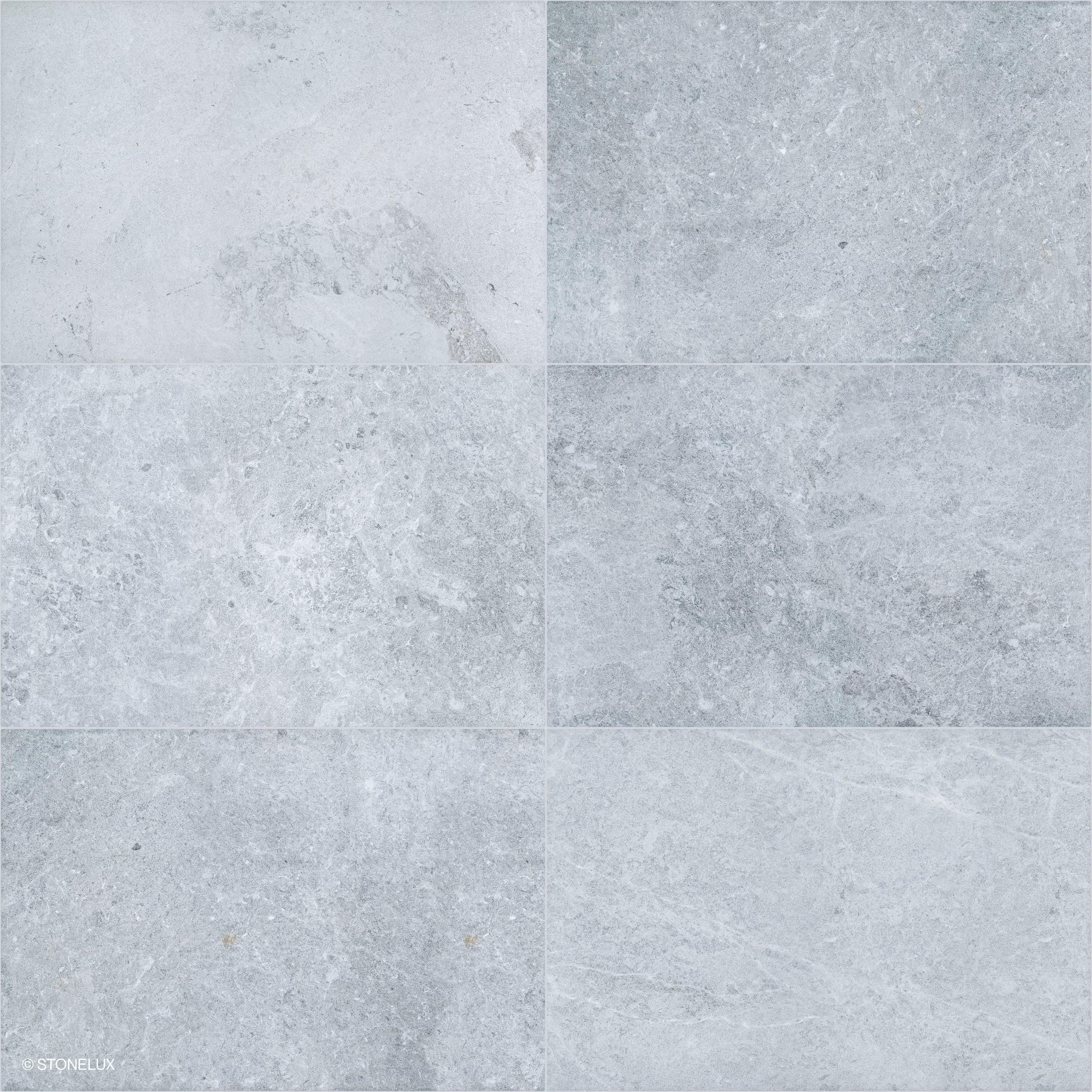 Close-up of the Tundra Grey Marble Sand Blasted 24x36 3cm Paver. This premium marble features a sandblasted finish with subtle grey tones and intricate veining, ideal for elegant hardscape projects and pool builds. Perfect for modern outdoor spaces.