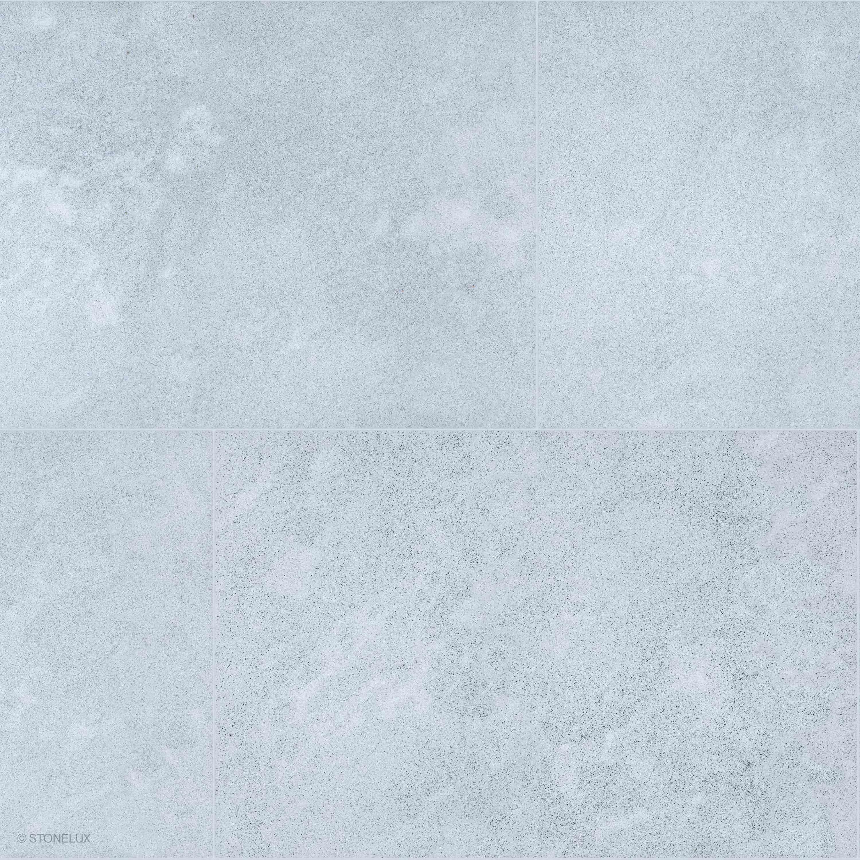 Product view of Afyon Grey Marble Sand Blasted 24x36 3cm Paver, showing a light cool-grey marble surface with fine blue-grey speckling, soft cloudy movement, and its textured finish.