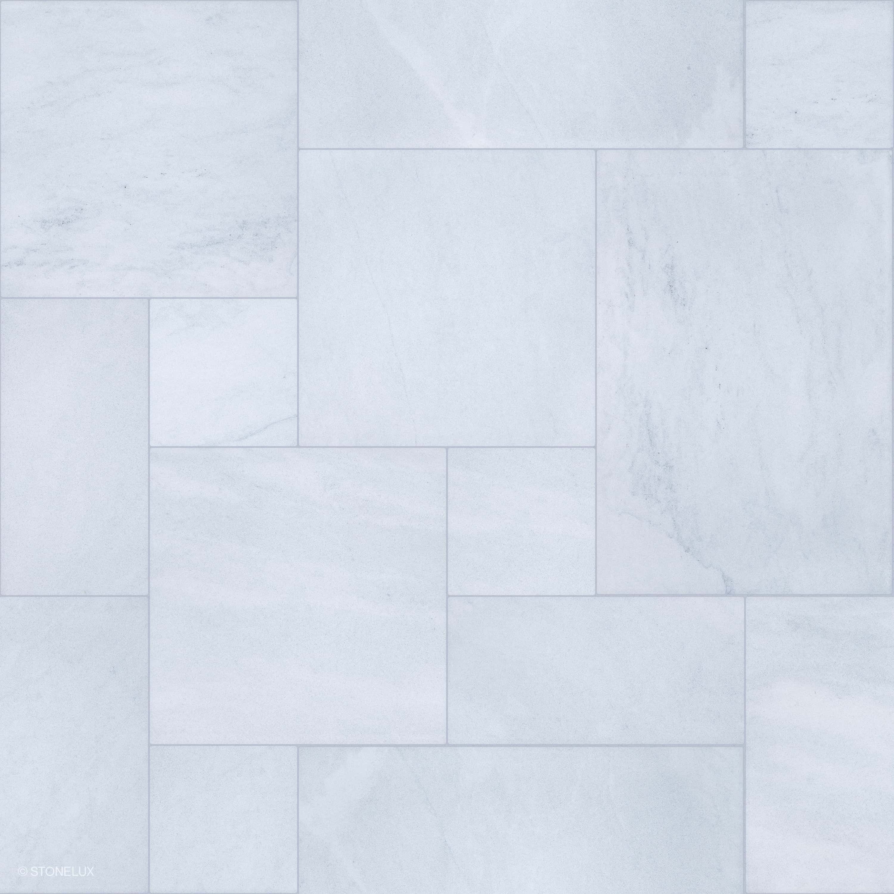 Close-up of the Afyon White Marble Sand Blasted French Pattern 3cm Paver. The marble displays a subtle white hue with gentle veining and a textured sandblasted finish, ideal for elegant hardscape and pool projects. SKU: PAV-AFYWHIMAR-SB-FREPAT.