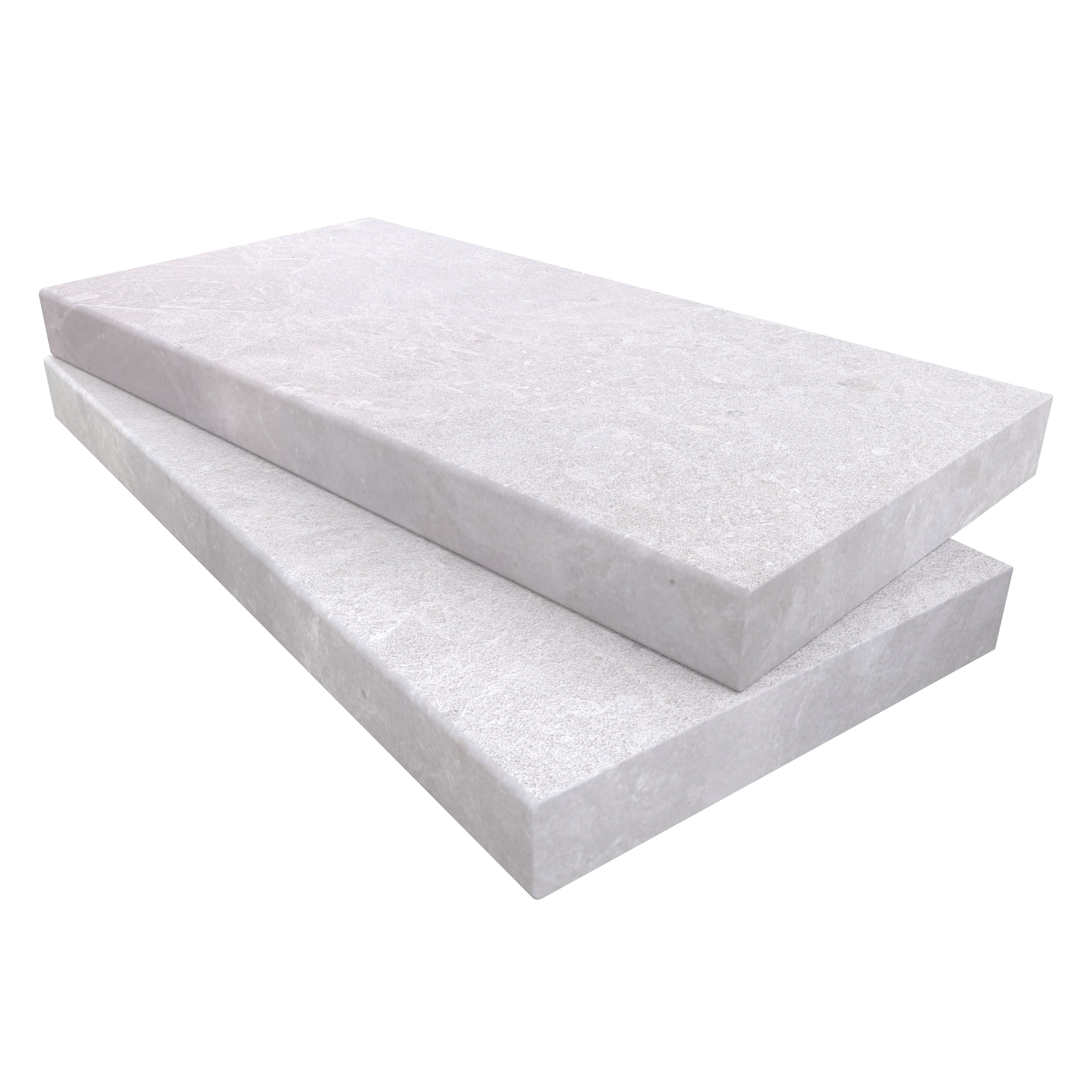 Close-up of Pera Cream Marble Sand Blasted 12x24x2 Eased Edge Coping. The marble features a light cream hue with a textured sandblasted finish, highlighting subtle veining. Ideal for pool edges and steps. High-quality, durable material from STONELUX.