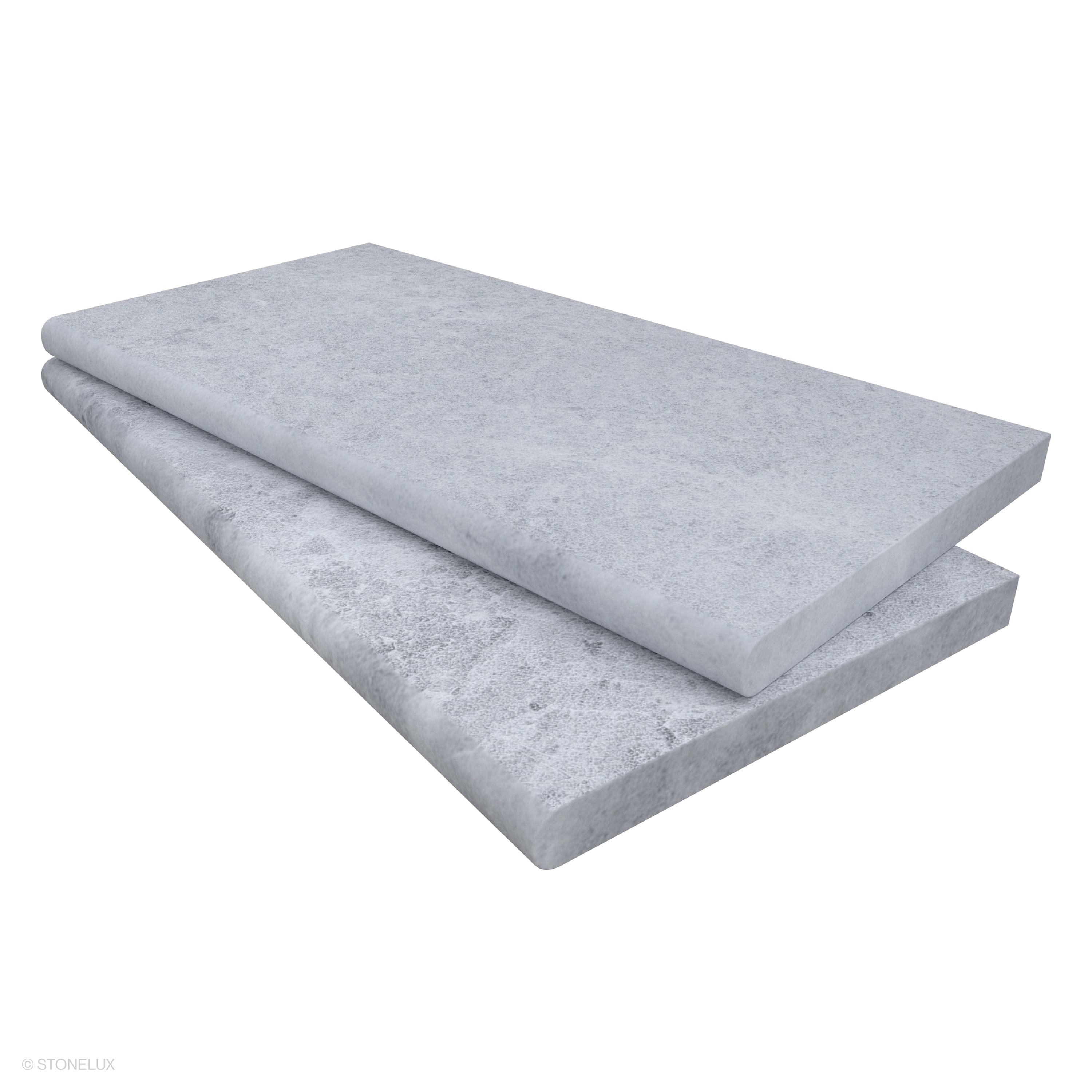 Close-up of the Tundra Grey Marble Sand Blasted 12x24x3cm Single Bullnose Coping, showcasing its smooth sandblasted finish and subtle grey tones. Ideal for pool edges and wall caps, this marble coping offers a refined, durable edge with a single bullno...