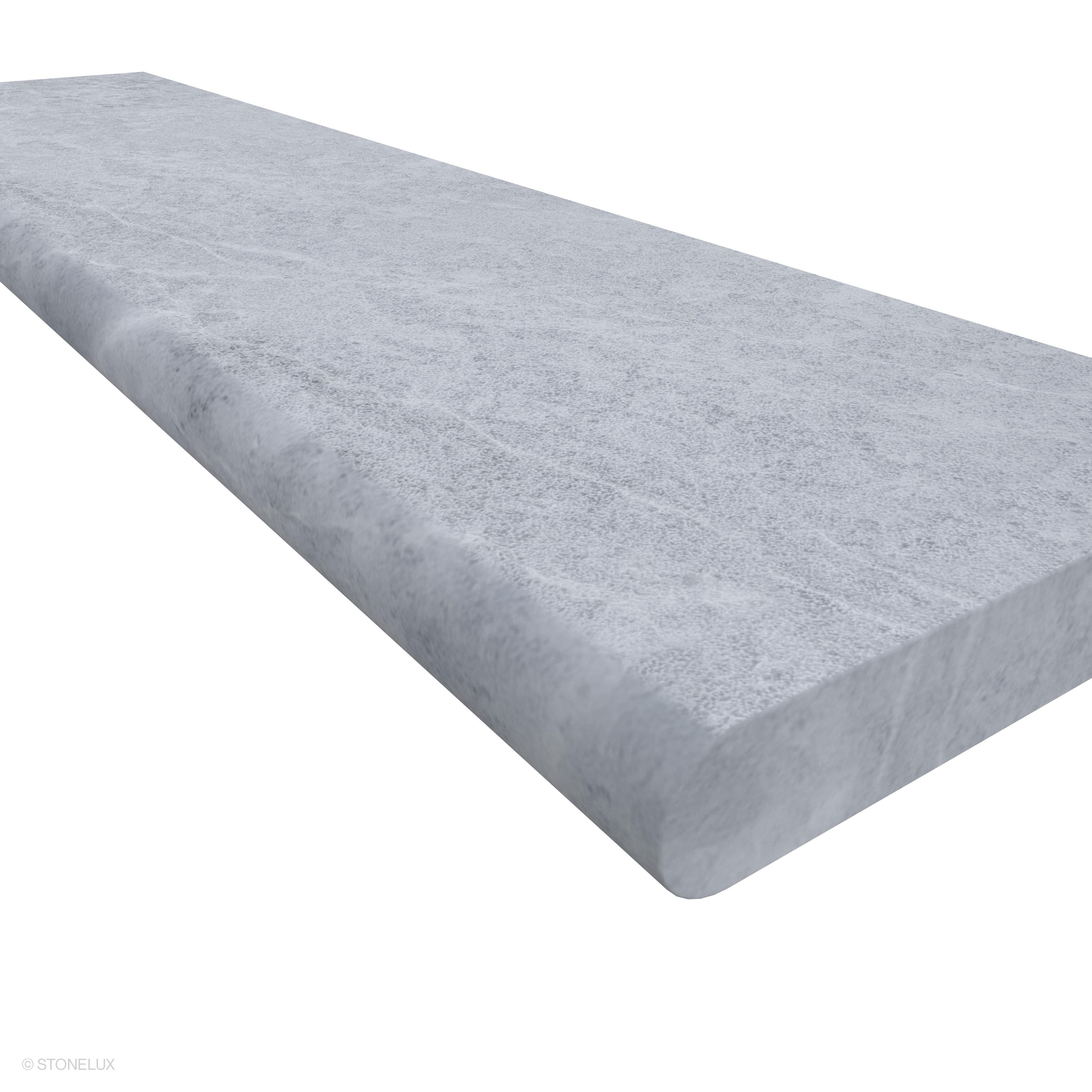 Close-up of Tundra Grey Marble Sand Blasted 12x48x2 Single Bullnose Coping by STONELUX. The marble features a sandblasted finish with subtle grey tones and natural veining, highlighting its smooth, rounded single bullnose edge, ideal for pool edges or ...