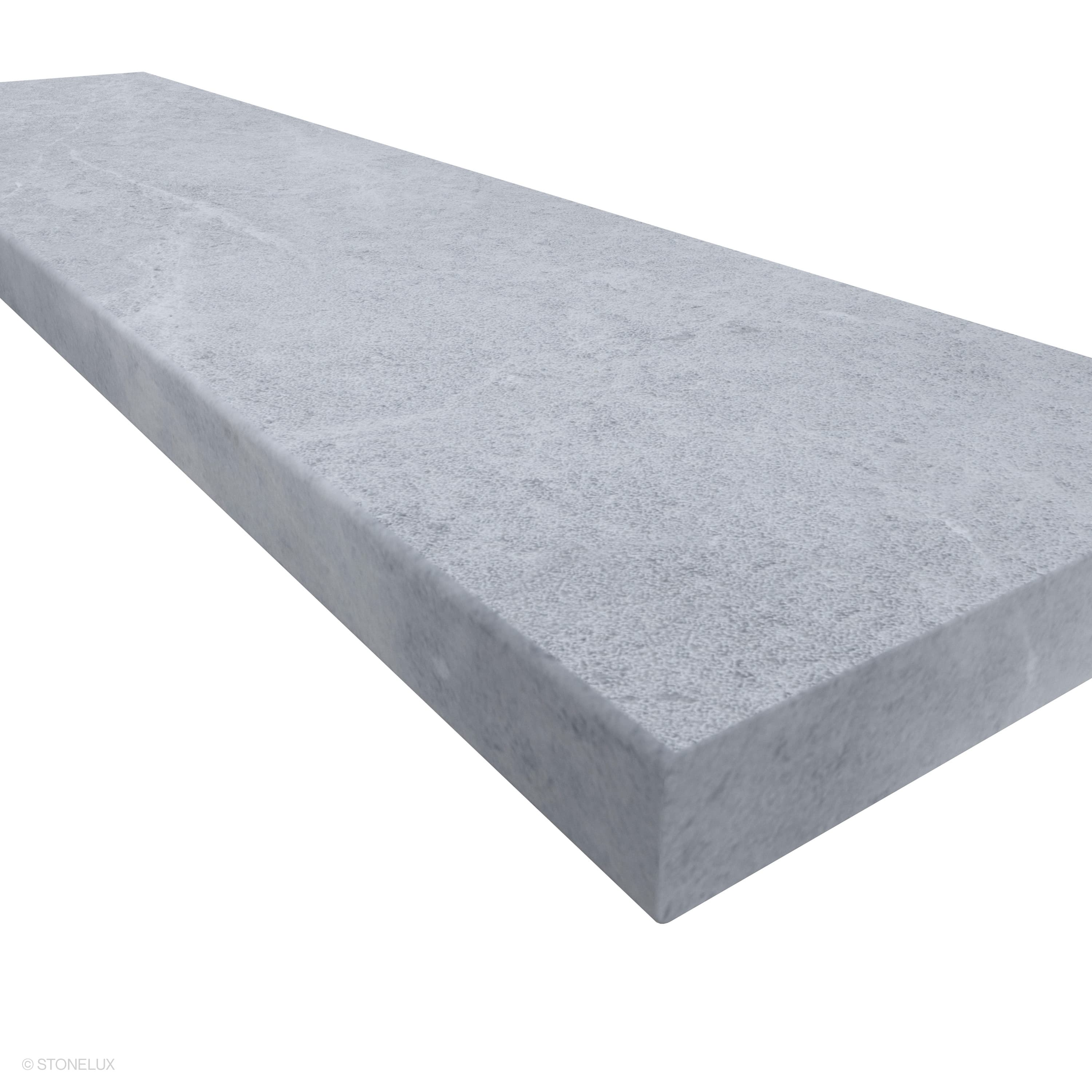 Close-up of Tundra Grey Marble Sand Blasted Coping by STONELUX, featuring a smooth, sandblasted surface with subtle grey veining. Measuring 12x48 inches with a 2-inch thickness and eased edge profile, ideal for pool and wall caps.