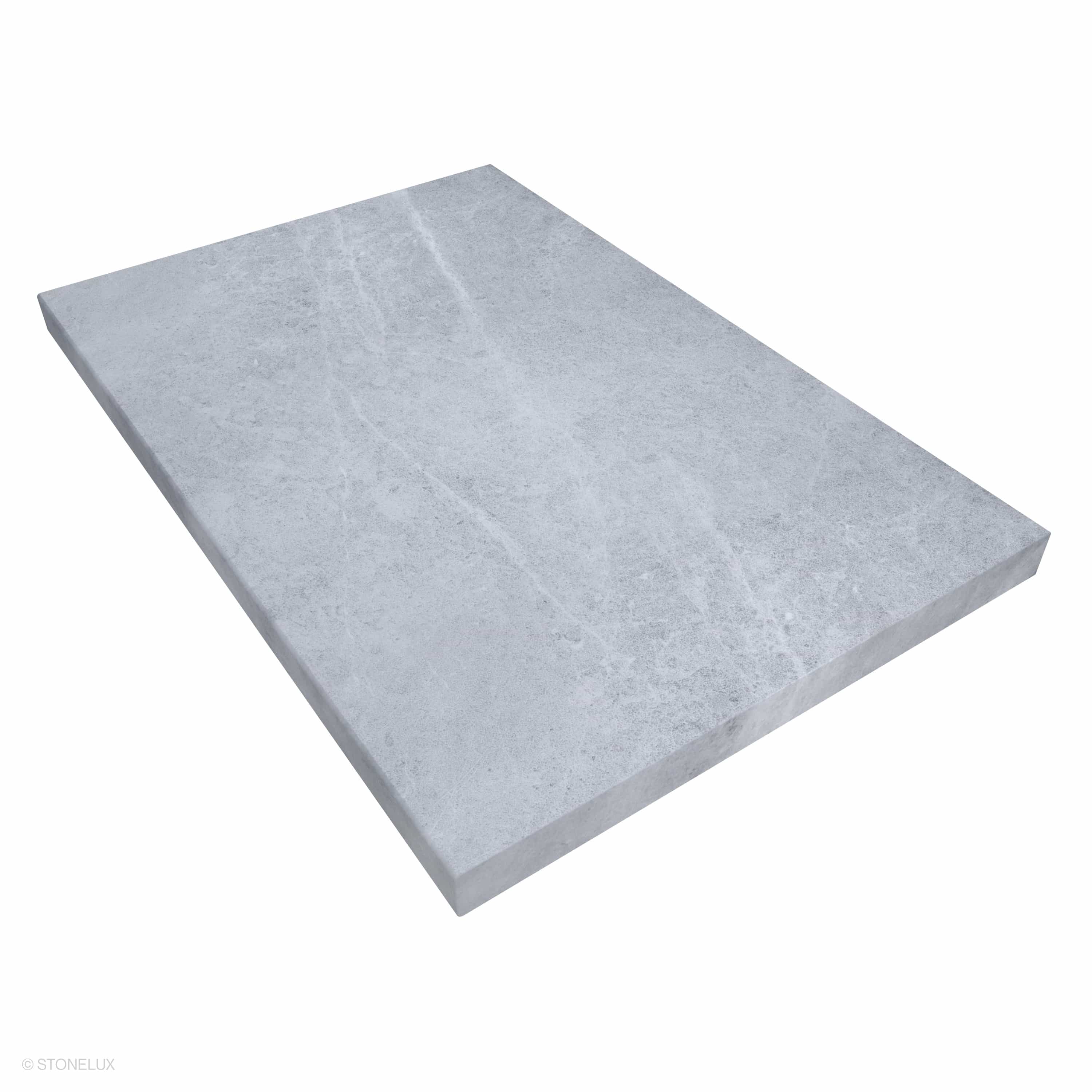 Close-up of the Tundra Grey Marble Sand Blasted 24x48x2 Eased Edge Coping by STONELUX. This marble piece features a textured, sandblasted surface with subtle grey veining, ideal for pool edges or wall caps. Durable and elegant, perfect for modern hards...