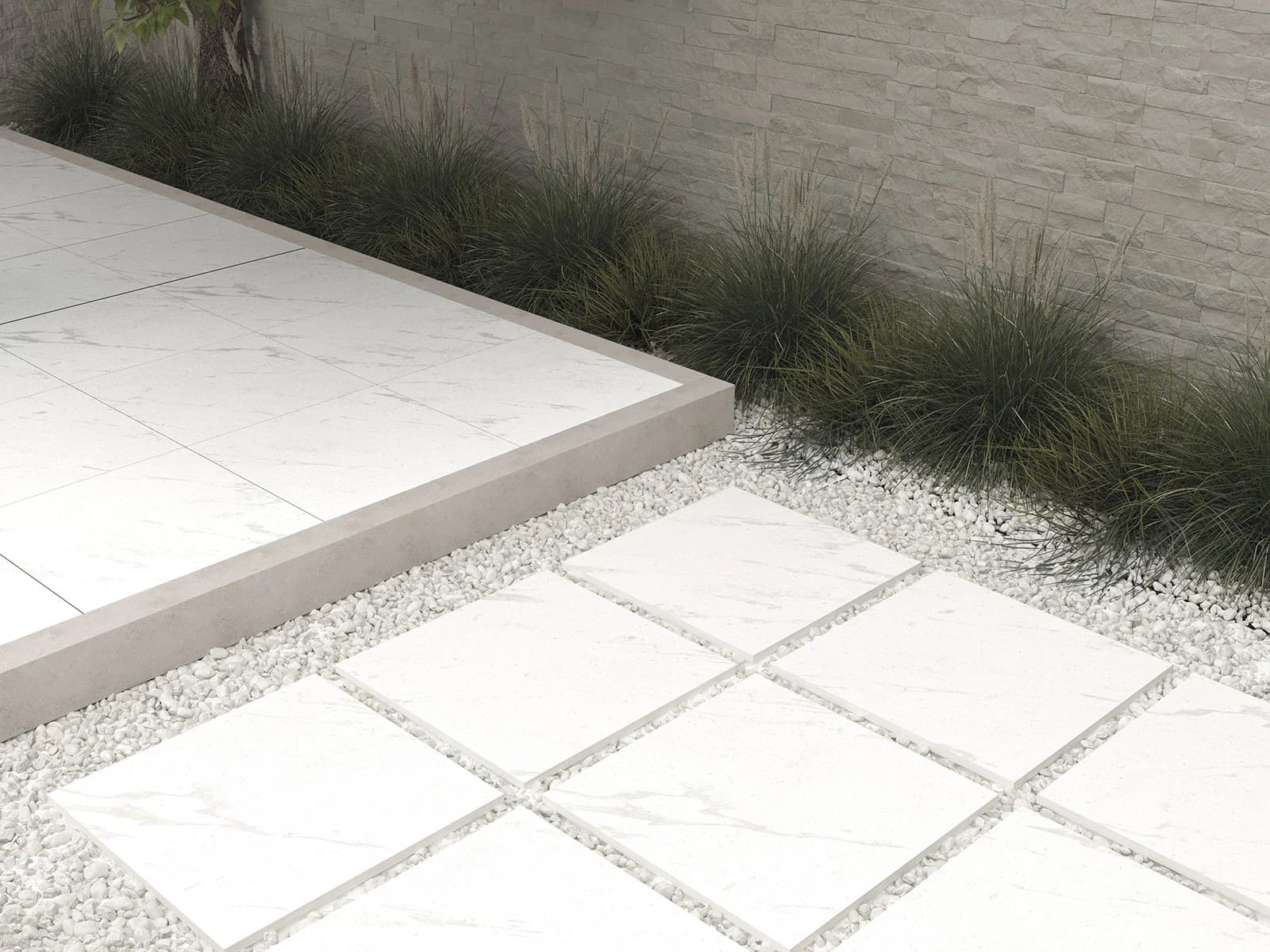 Outdoor installation featuring Tokyo White Matte 24x24x2cm Rectified Porcelain Pavers. The matte finish offers a sleek, modern look against a backdrop of lush green plants and stone-textured walls, ideal for elegant patio or pathway designs.