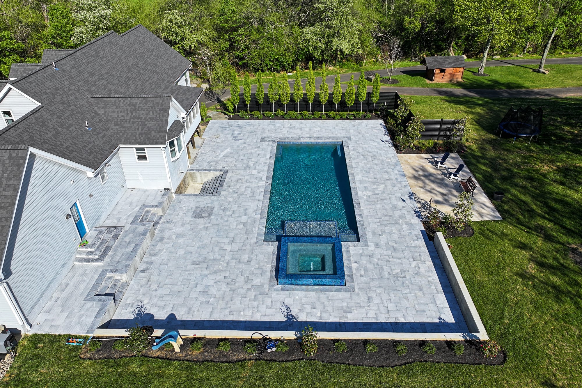 Arctic Retreat: Luxury Pool and Patio with Arctic Grey Marble Pavers
